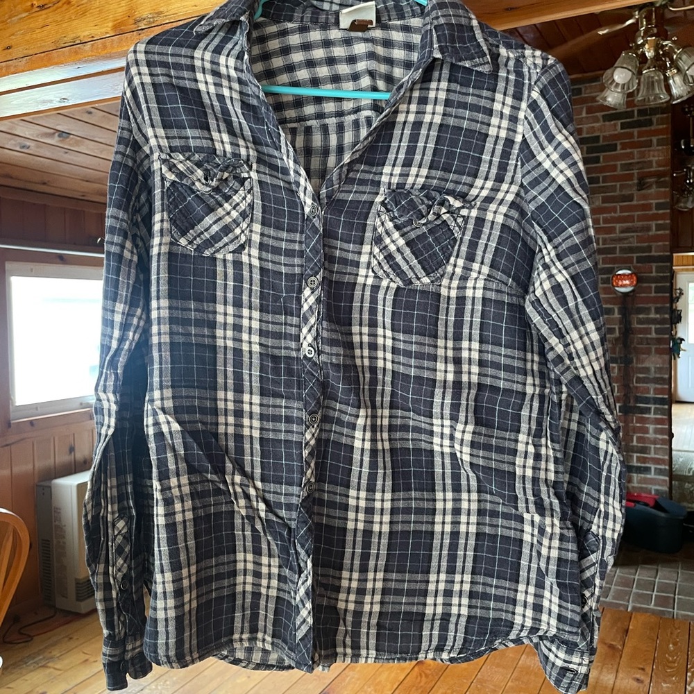 Shirt it says large but I would say between a small and med
